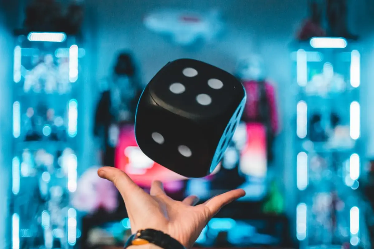 Large gaming die in a modern setting
