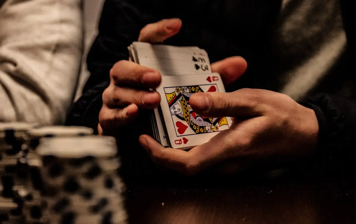 Playing cards held during a card game